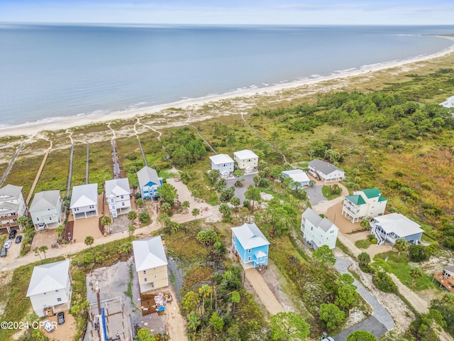 aerial view featuring a water view and a view of the beach