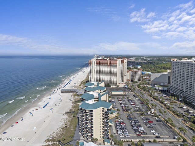 bird's eye view with a view of the beach and a water view