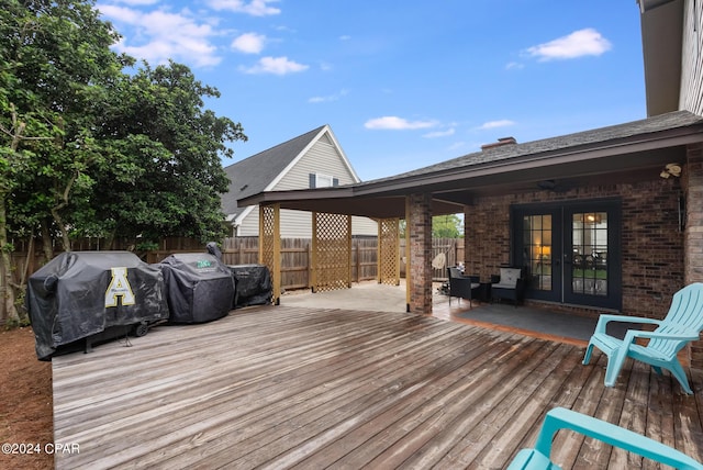 deck with a grill and french doors