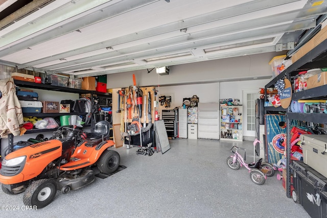 garage featuring a garage door opener