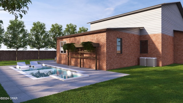 view of swimming pool featuring a jacuzzi, a yard, cooling unit, and a patio