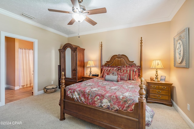 bedroom featuring baseboards, visible vents, ornamental molding, a textured ceiling, and carpet flooring