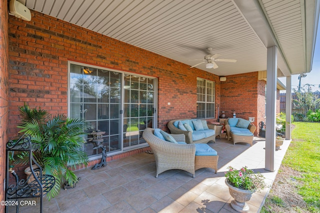 view of patio with a ceiling fan and outdoor lounge area