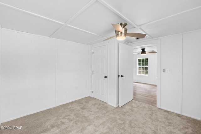 carpeted empty room with ceiling fan