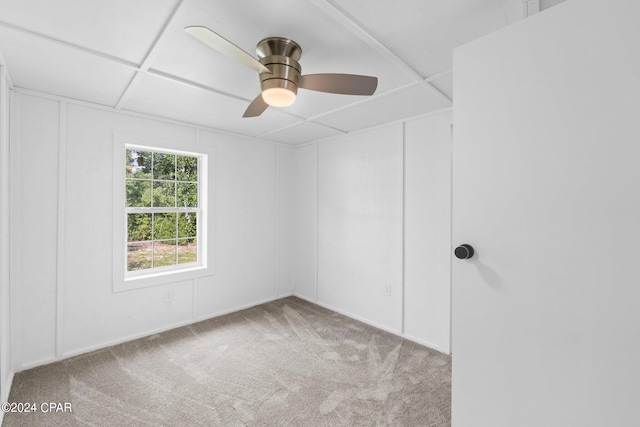 unfurnished room featuring ceiling fan and light colored carpet