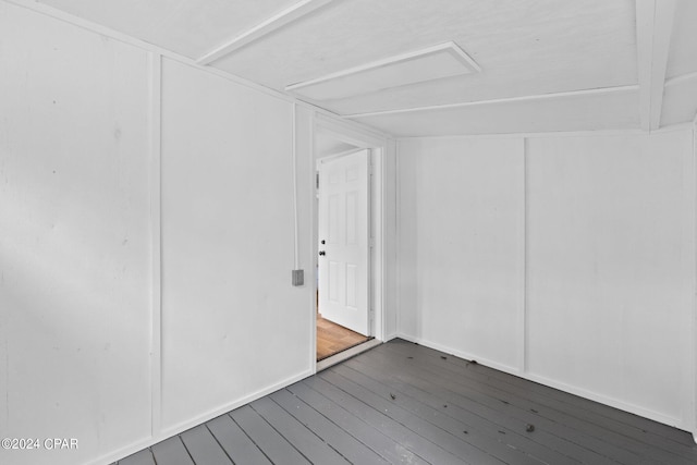 unfurnished room featuring dark hardwood / wood-style floors