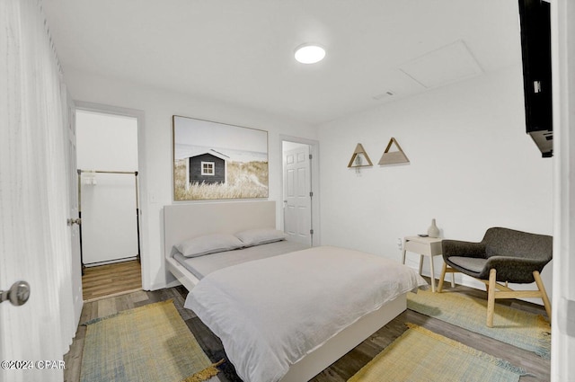 bedroom featuring hardwood / wood-style flooring