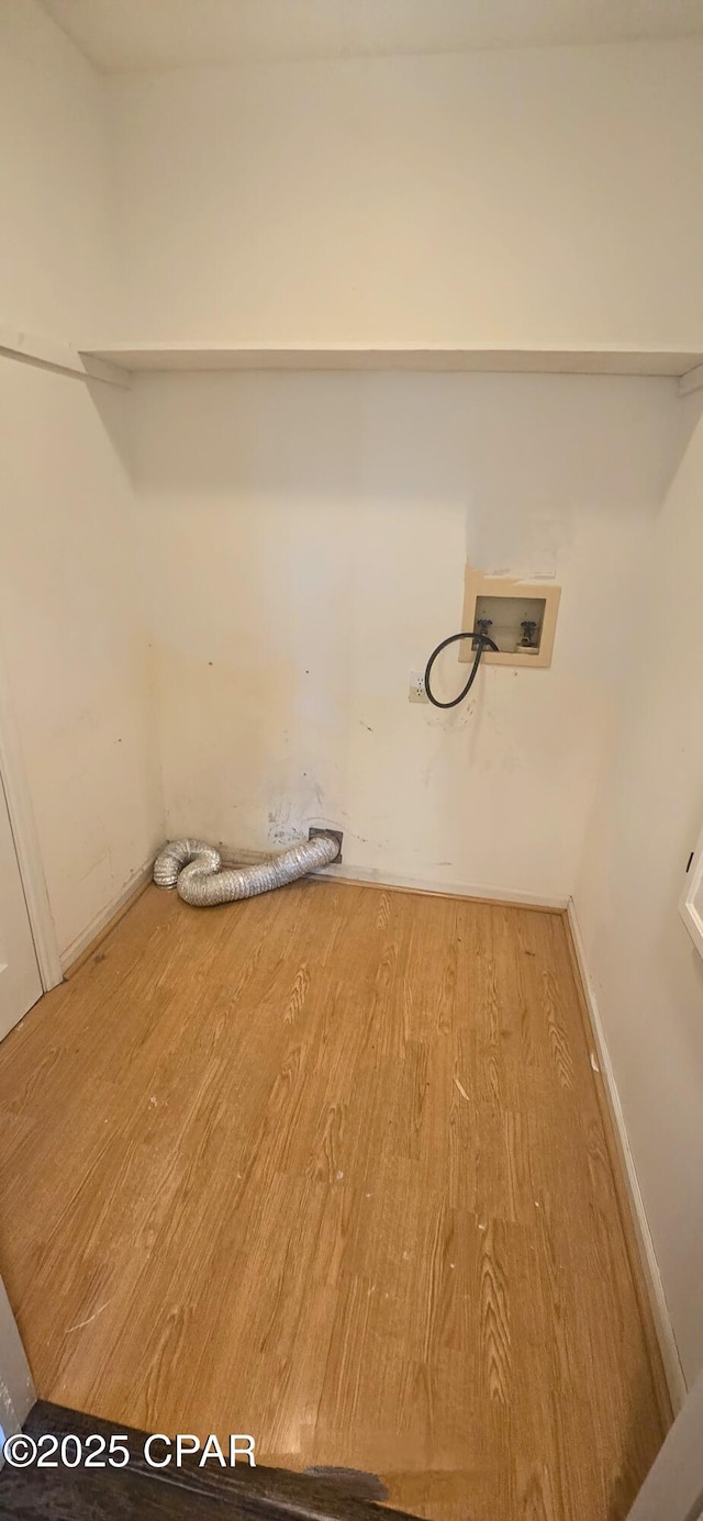 laundry room with hookup for a washing machine and hardwood / wood-style floors