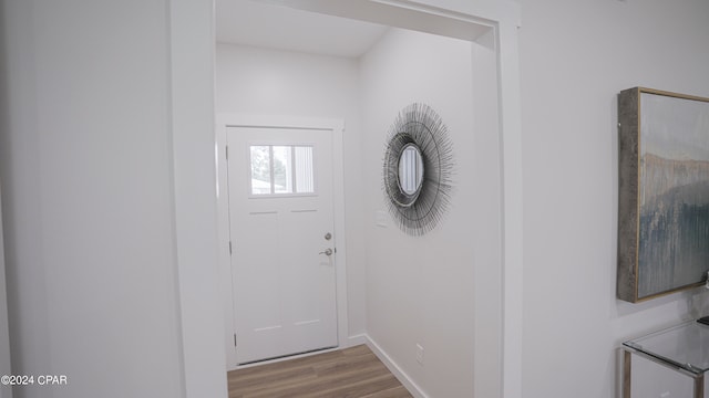 doorway to outside featuring light hardwood / wood-style floors