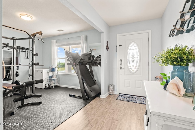 foyer entrance with light wood-type flooring