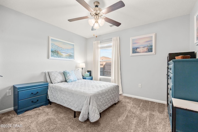 bedroom featuring ceiling fan and light colored carpet