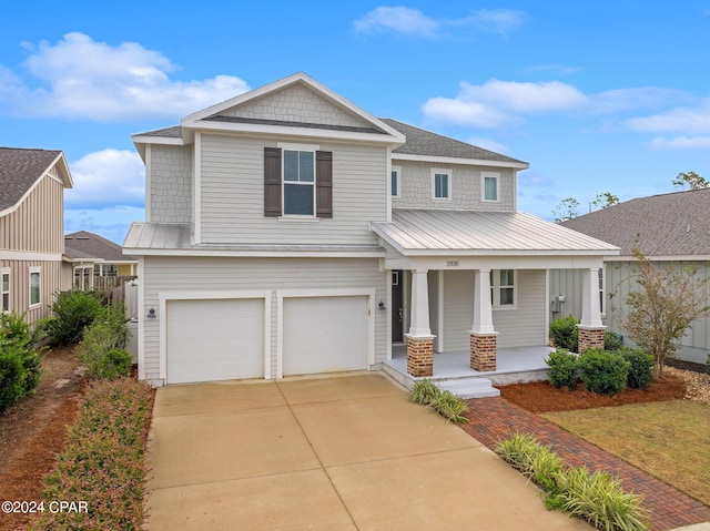 view of front of house with a garage and covered porch