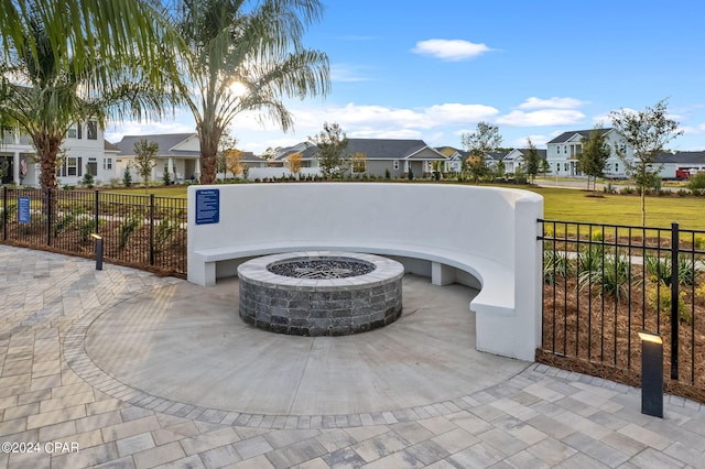 view of patio / terrace featuring an outdoor fire pit