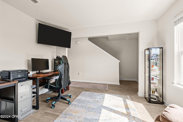 office space featuring light hardwood / wood-style floors