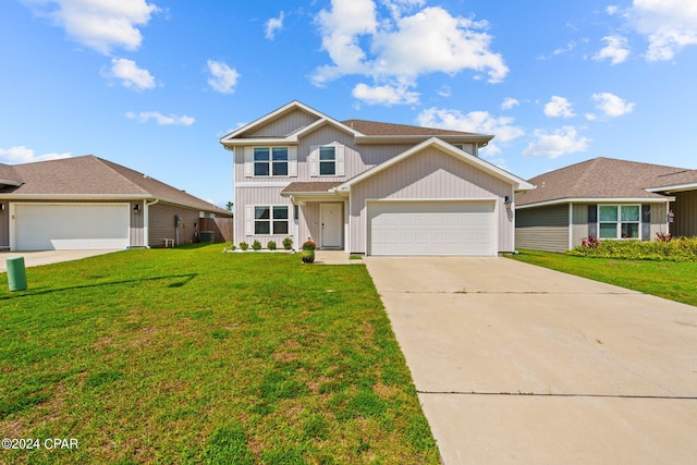 view of front facade featuring a front lawn and a garage