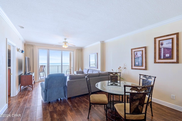 dining area featuring ornamental molding, dark hardwood / wood-style flooring, and ceiling fan