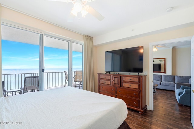 bedroom featuring ceiling fan, dark hardwood / wood-style floors, and access to exterior