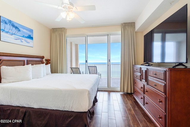 bedroom featuring access to outside, dark hardwood / wood-style flooring, and ceiling fan