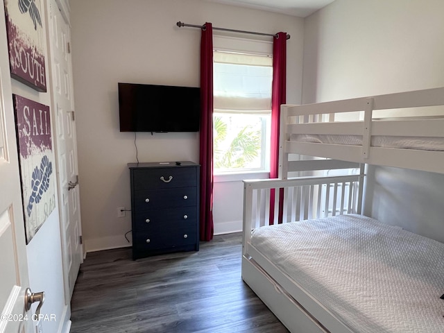 bedroom featuring dark wood-type flooring