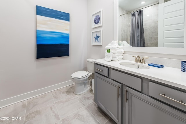 bathroom with toilet, tile patterned flooring, vanity, and curtained shower