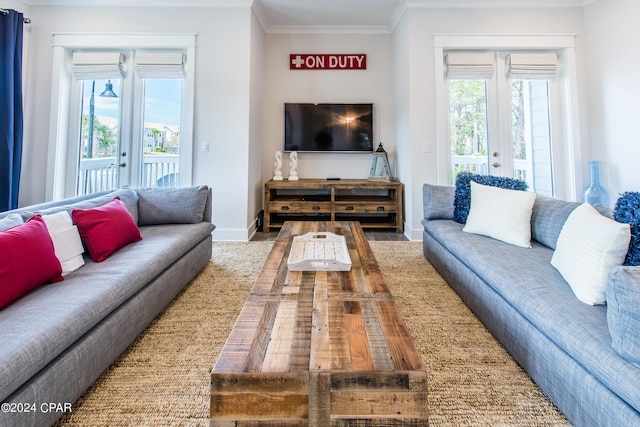 living room featuring crown molding and french doors