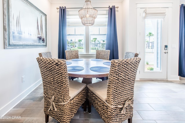 dining area with a notable chandelier