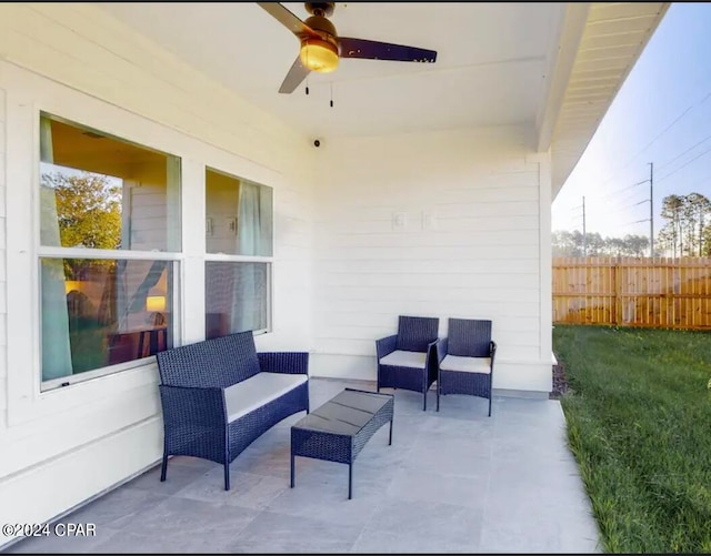 view of patio with ceiling fan and an outdoor hangout area