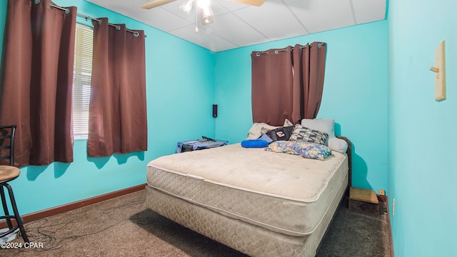 bedroom with ceiling fan and carpet floors