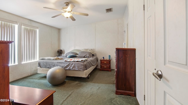 carpeted bedroom with ceiling fan