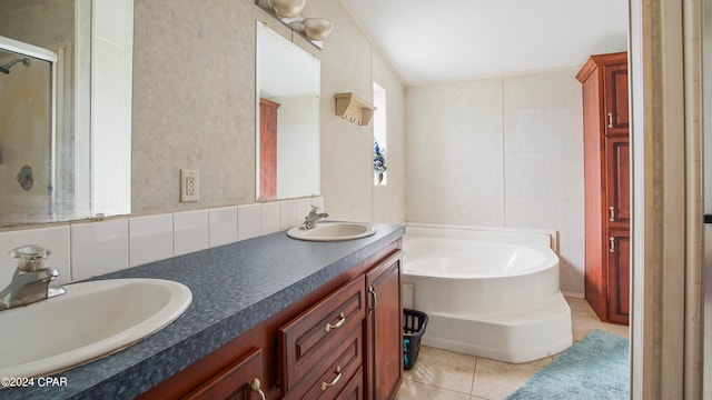 bathroom with vanity, separate shower and tub, and tile patterned floors