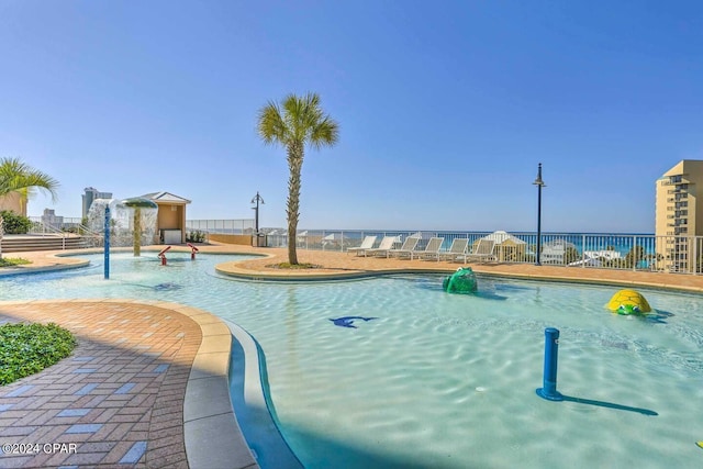 view of swimming pool featuring pool water feature