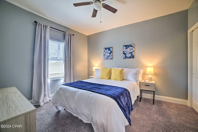 bedroom with ceiling fan and carpet flooring