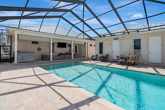 outdoor pool featuring a lanai, a patio area, and an outdoor living space