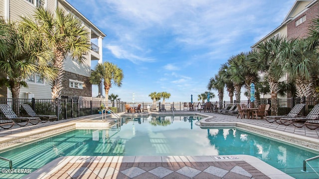 view of swimming pool featuring a patio