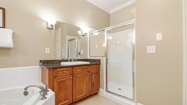 bathroom featuring tile patterned flooring, crown molding, vanity, and separate shower and tub