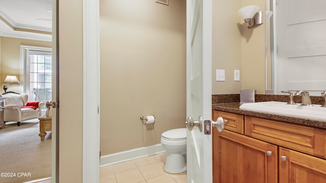 bathroom featuring ornamental molding, tile patterned flooring, vanity, and toilet