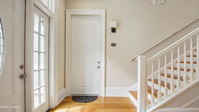 foyer with hardwood / wood-style floors