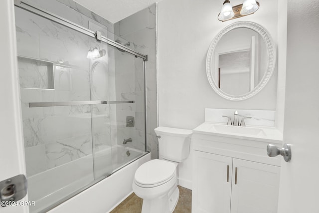 full bathroom featuring vanity, toilet, a textured ceiling, bath / shower combo with glass door, and tile patterned flooring