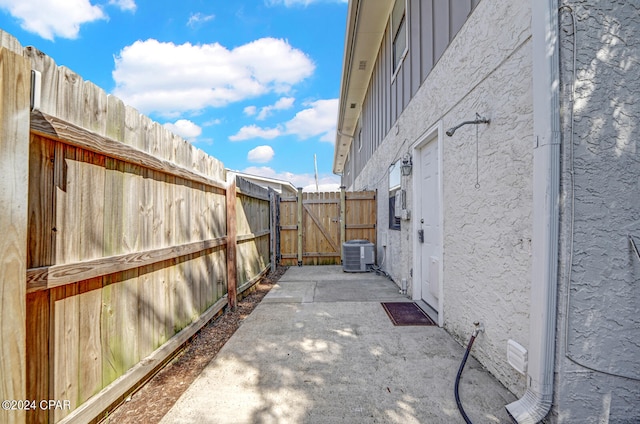 exterior space featuring a patio area and central air condition unit