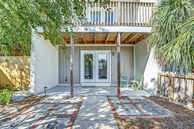 doorway to property with french doors and a patio