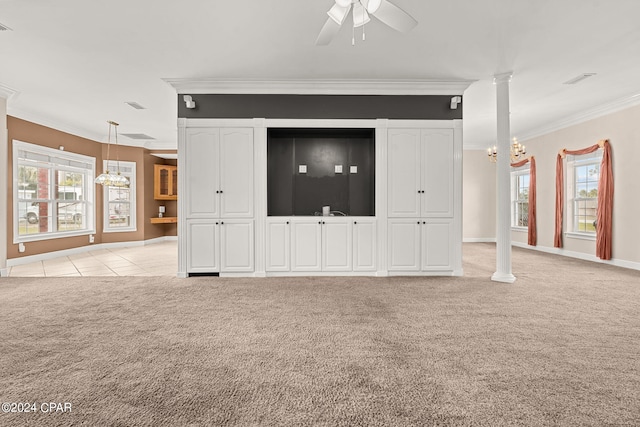 unfurnished living room featuring crown molding, ceiling fan with notable chandelier, light carpet, and plenty of natural light