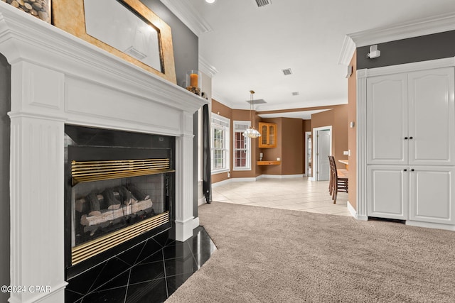 living room with crown molding, light carpet, and a chandelier