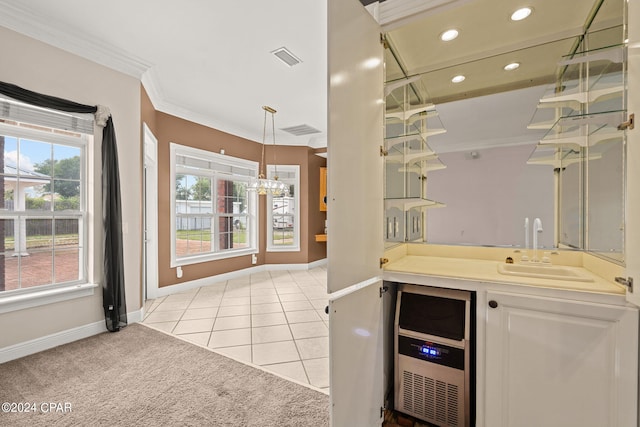 kitchen featuring light carpet, wine cooler, ornamental molding, and sink