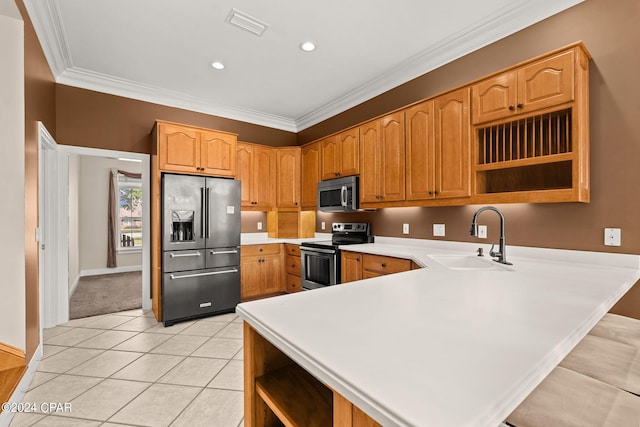 kitchen featuring appliances with stainless steel finishes, ornamental molding, sink, and light tile patterned floors