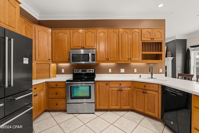 kitchen featuring appliances with stainless steel finishes, light tile patterned flooring, ornamental molding, and sink