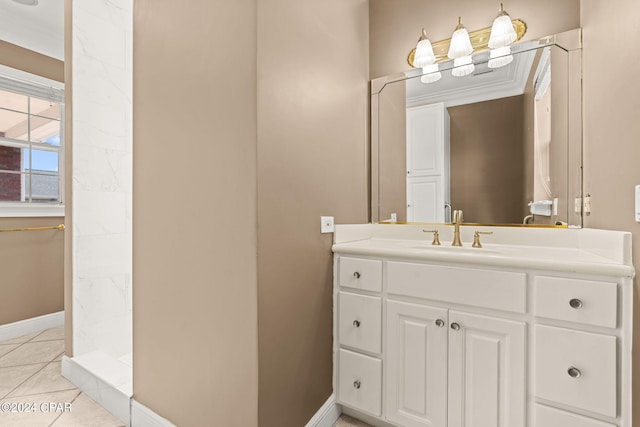 bathroom featuring tile patterned flooring, a shower, and vanity