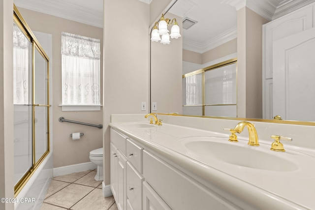 full bathroom with combined bath / shower with glass door, tile patterned floors, ornamental molding, vanity, and toilet