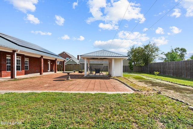 view of yard with a patio and a gazebo