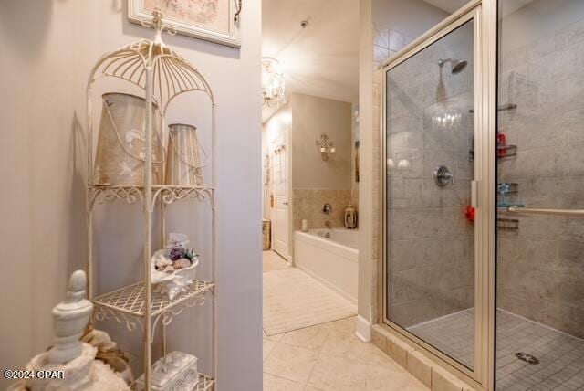 bathroom with tile patterned flooring and plus walk in shower