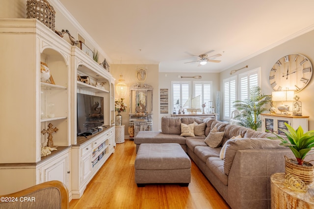 living room featuring ceiling fan, light hardwood / wood-style floors, and ornamental molding